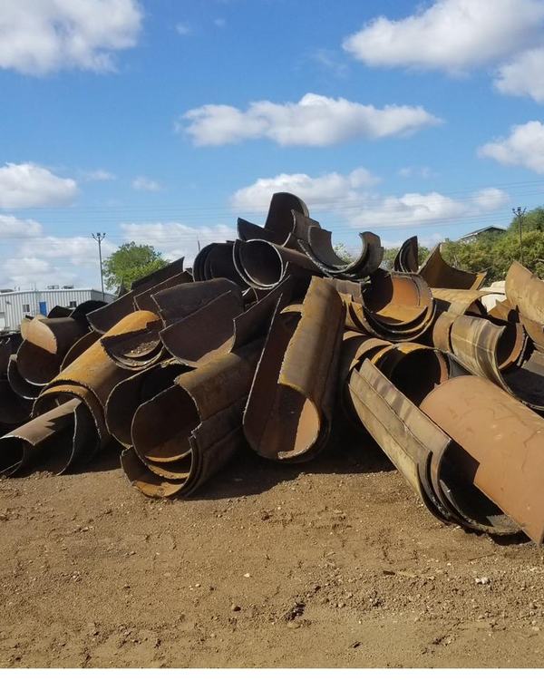 Half-moon cut pipe in a yard
